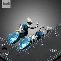 sea blue crystal drop earrings detail view by KHAISTA
