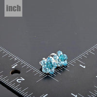 sea blue crystal flower stud earrings detail view by KHAISTA