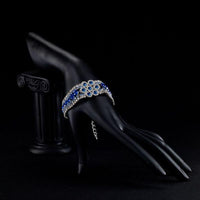 Side angle view of KHAISTA sea blue princess crystal bracelet