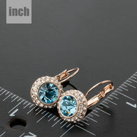 sea blue round crystal earrings detail view by KHAISTA