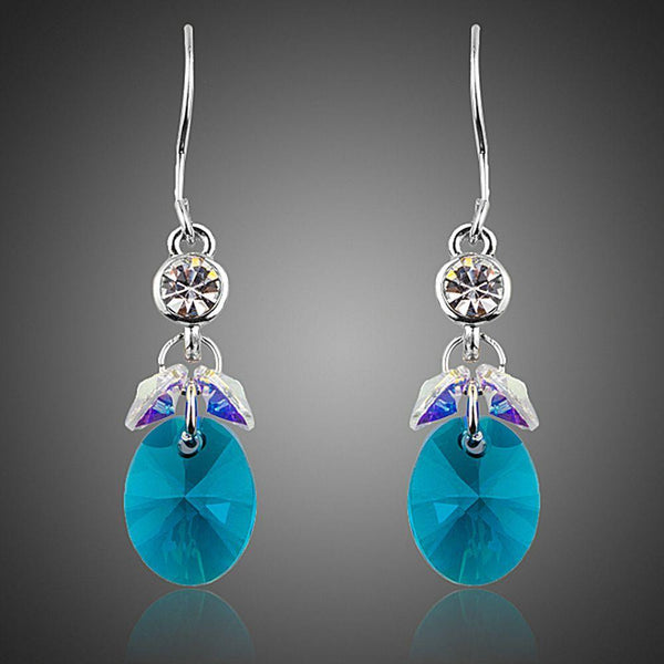 KHAISTA sea blue rhinestone crystal drop earrings on white background