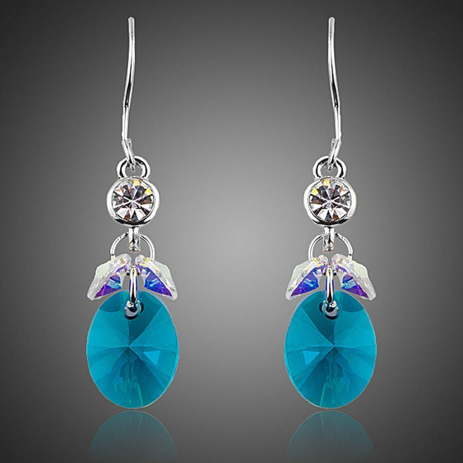 KHAISTA sea blue rhinestone crystal drop earrings on white background