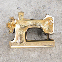 Close-up of crystals on Khaista sewing machine brooch
