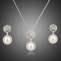 Khaista simulated pearl necklace and earrings set on white background