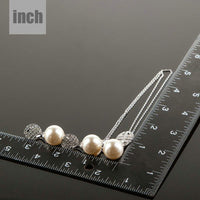 Pearl necklace detail view by Khaista