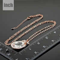 Pendant detail on KHAISTA butterfly on large crystal pendant necklace