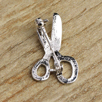 Scissors design detail on Khaista crystal brooch