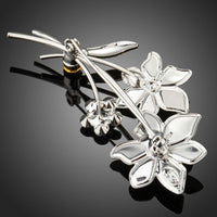 Close-up of sky blue crystals on Khaista flower brooch