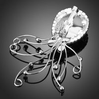 Close-up of blue crystals on Khaista octopus brooch