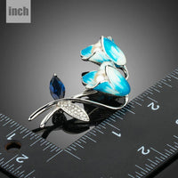 Oil paint flower detail on Khaista sky blue brooch