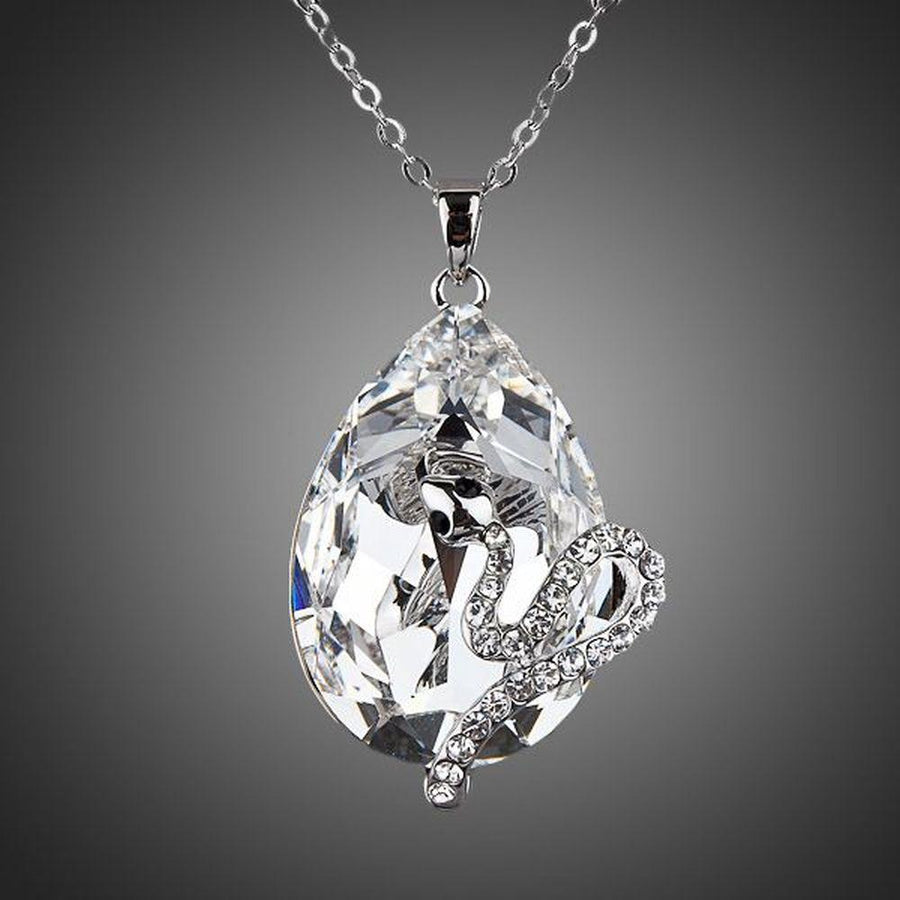 KHAISTA sleeping snake crystal chain necklace on white background