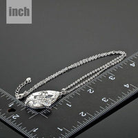 Pendant detail on KHAISTA sleeping snake crystal chain necklace