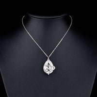 Close up detail of KHAISTA sleeping snake crystal chain necklace