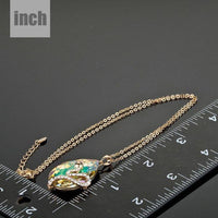 Pendant detail on KHAISTA sleeping snake crystal pendant necklace
