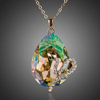 KHAISTA sleeping snake crystal pendant necklace on white background