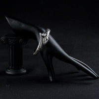Side angle view of KHAISTA crystal snake design bangle