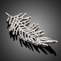 Close-up of crystals on Khaista sparkly leaves brooch