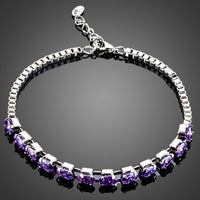 KHAISTA purple crystal lobster bracelet on white background