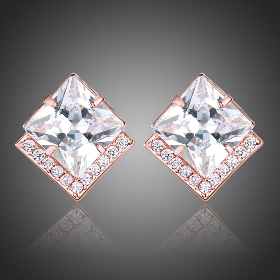 KHAISTA square cut CZ stud earrings on white background