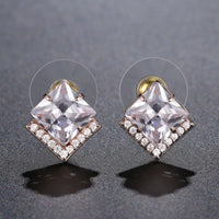 Side angle view of KHAISTA square cut CZ stud earrings