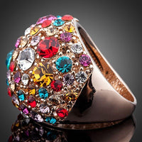 Side angle view highlighting the comfortable band silhouette of the luxury multicolor crystal star ring