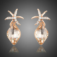 KHAISTA starfish rhinestone drop earrings on white background