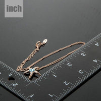 Pendant detail on KHAISTA starfish blue crystal flower necklace