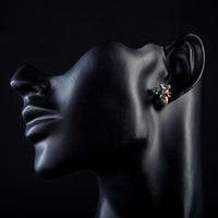 Close up of KHAISTA Stellux Austrian crystal flower stud earrings