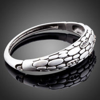 Close up detail of KHAISTA stone wall design crystal bangle