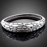 KHAISTA stone wall design crystal bangle on white background