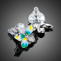 Close up of KHAISTA summer flower CZ stud earrings