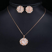 Side angle view of Khaista sun opal set