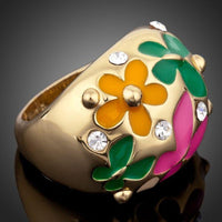 Detailed macro close up view of the brilliant stone settings on this premium sunflower butterfly enamel ring