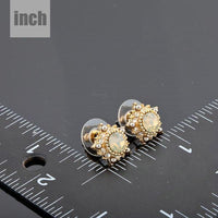 sunflower design crystal stud earrings detail view by KHAISTA