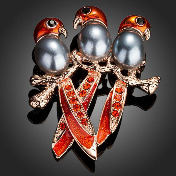Khaista three red birds crystal brooch on white background