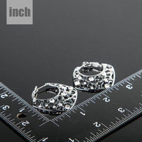 transparent Stellux Austrian hoop earrings detail view by KHAISTA