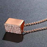 Pendant detail on KHAISTA purse shape rectangle CZ pendant necklace