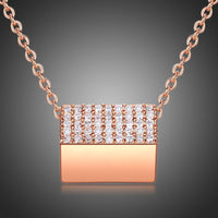 KHAISTA purse shape rectangle CZ pendant necklace on white background
