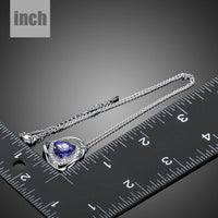 Pendant detail on KHAISTA triangular royal blue crystal pendant necklace
