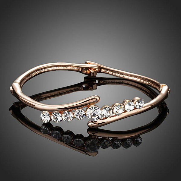 KHAISTA twist design crystal bangle on white background