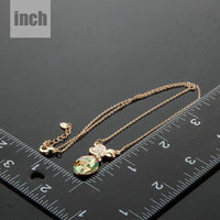 Pendant detail on KHAISTA two leaf clover crystal pendant necklace
