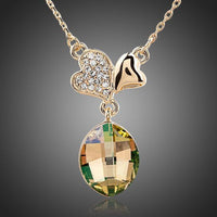 KHAISTA two leaf clover crystal pendant necklace on white background