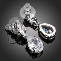 Close up of KHAISTA waterfall crystal drop earrings