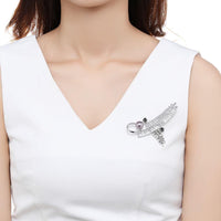 Side angle view of Khaista vintage leaf branch brooch