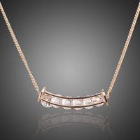 KHAISTA connected waterdrop crystal pendant necklace on white background