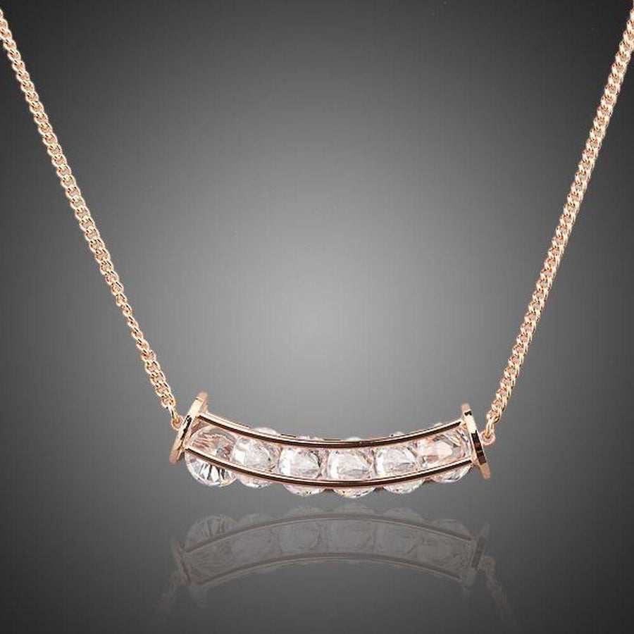 KHAISTA connected waterdrop crystal pendant necklace on white background