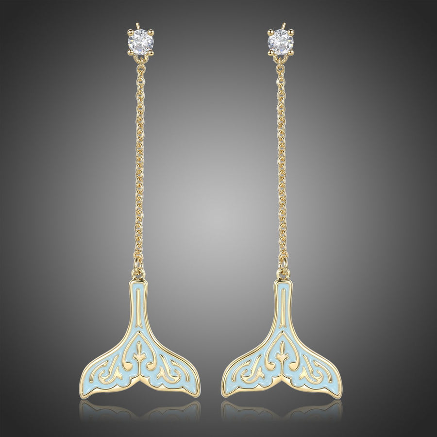KHAISTA crystal whale fluke drop earrings on white background