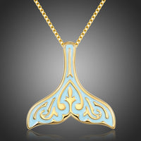 KHAISTA crystal whale fluke pendant necklace on white background