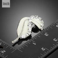 Close-up of crystal on Khaista banana leaf brooch