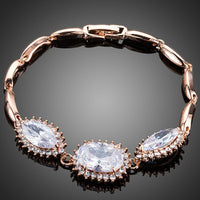 KHAISTA white CZ link chain bracelet on white background